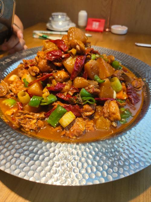 新疆大盘鸡食谱_新疆大盘鸡皮带面_正宗大盘鸡做法